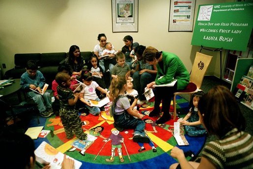 Laura Bush reads “The Very Hungry Caterpillar” to children in the Pediatric Unit of Chicago Hospital during a visit to promote Reach Out and Read Programs in Chicago, Illinois, May 14, 2001. White House photo by Paul Morse.