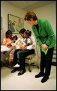 Laura Bush visits with patients and personnel in the Chicago Hospital Pediatric Unit during a visit to promote the Read Out and Read Program in Chicago, Illinois, May 14, 2001. White House photo by Paul Morse.