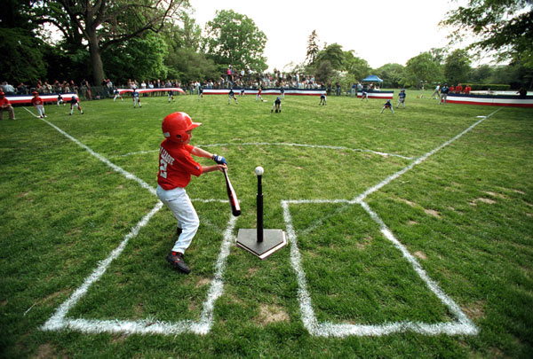 A Rockies player swings during Tee Ball on the South Lawn. The Rockies are part of Capitol City Little League in Washington, D.C. WHITE HOUSE PHOTO BY DAVID BOHRER