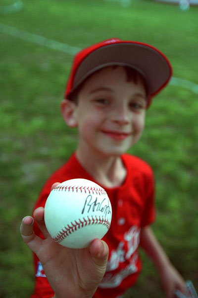 A Rockies player shows off his signed baseball from the afternoon. WHITE HOUSE PHOTO BY DAVID BOHRER