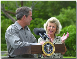 President George W. Bush looks to Fran Maniella after announcing her as Director of National Parks Service during remarks at Royal Palm Visitors Center at Everglades National Park in Florida, Monday June 4. WHITE HOUSE PHOTO BY ERIC DRAPER