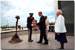 President George W. Bush lays a wreath during dedication ceremonies of the D-Day Memorial in Bedford, Va., on Wednesday, June 7. 