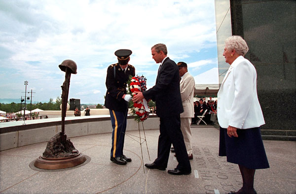 President George W. Bush lays a wreath during dedication ceremonies of the D-Day Memorial in Bedford, Va., on Wednesday, June 7.