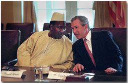 President George W. Bush talks with Mali President Alpha Konare during his meeting with African presidents in the Cabinet Room, Thursday, June 28, 2001. WHITE PHOTO BY ERIC DRAPER