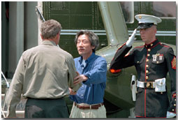 President Bush greets Prime Minister Koizumi of Japan at Camp David June 30, 2001 