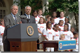 President Bush and Secretary of State Colin Powell hold a
	press conference about Powell's organization, America's
	Promise, in the Rose Garden July 9, 2001. White House photo by
	Moreen Ishikawa.