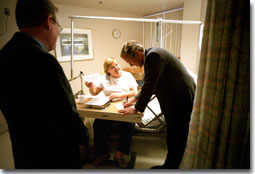 While
	addressing the upcoming patients' bill of rights legislation,
	President Bush gets a little practice signing his name while
	meeting patients at Inova Fair Oaks Hospital in Fairfax, VA,
	July 9, 2001. 