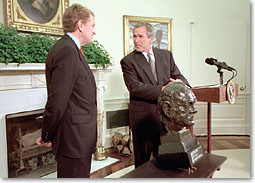 President Bush accepts a bust of Sir Winston Churchill from ambassador of England, Sir Christopher Meyer July 16, 2001. "He was a man of great courage. He knew what he believed. And he really kind of went after it in a way that seemed like a Texan to me," said the President explaining why he would like the likeness of an Englishman placed inside the Oval Offfice. "He charged ahead, and the world is better for it.". White House photo by Paul Morse.