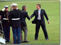 British Prime Minister Tony
Blair welcomes President Bush to Chequers in Halton, England, July 19.
Like Camp David, which Mr. Blair visited in February, Chequers is a
private residence for the Prime Minister where the two leaders can talk
privately. "I think it is yet another example of the strength of
the relationship between our two countries. It is a very strong
relationship, a very special one," said Mr. Blair during a press
conference where he welcomed President Bush. White House photo by Eric
Draper.