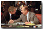 President Bush and President Chirac of France talk over issues during the G-8 sessions, July 21, 2001. White House photo by Paul Morse.