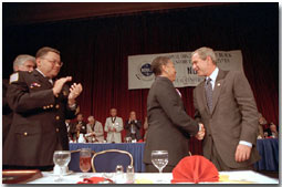 President Bush thanks his hosts for a warm welcome just before addressing the 25th annual conference of the National Organization of Black Law Enforcement Executives at the Marriot Wardman Park Hotel in Washington, D.C., July 30, 2001. White House photo by Eric Draper.