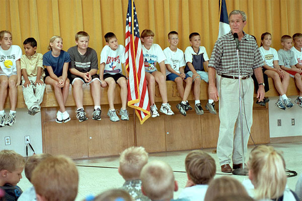 During an impromptu visit to Crawford Elementary School Aug. 23, President Bush fielded a variety of question from inquisitive students who wanted to know what is it like being President, where the White House is located, how old the President is and what he scored in a recent round of golf. "Too high to count," replied President Bush laughing. White House photo by Moreen Ishikawa.
