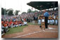 President Bush kicks off the Little League World Series with a thank you to all the parents, coaches and volunteers who donate their time to childrens' sports during his induction ceremony into Little League's Hall of Excellence Aug. 26 in Williamsport, Pa. "You prioritize your family and that's crucial for a healthy world, to make sure our families remain strong," said the President. "I equate Little League baseball with good families.". White House photo by Moreen Ishikawa.