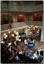 Guided by White House Webmaster Jane Cook,, President Bush and First Lady Laura Bush tour through the new, restructured White House website in the historic Dwight D. Eisenhower Executive Office Building Library Aug. 31. White House photo by Tina Hager.