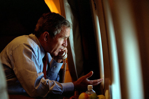 President George W. Bush speaks to Vice President Dick Cheney by phone aboard Air Force One after departing Offutt Air Force Base in Nebraska, Tuesday, Sept. 11, 2001. White House photo by Eric Draper