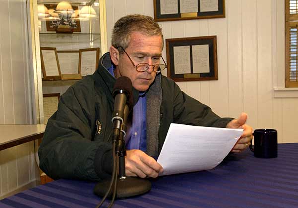 President George W. Bush delivers his weekly radio address to the nation from Camp David, Saturday, Sept. 15, 2001. White House photo by Eric Draper.