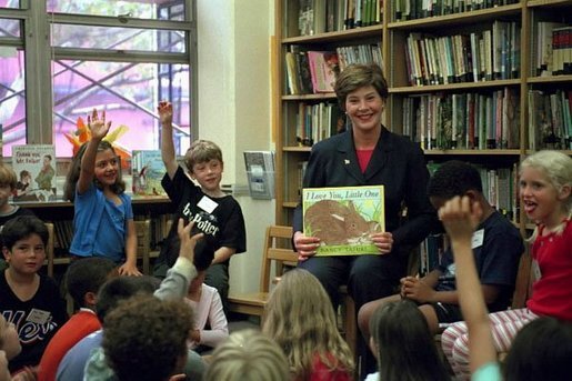 Laura Bush reads " I Love You, Little One" by Nancy Tafuri to students at Public School 41 in New York City, Sept. 25, 2001. White House photo by Moreen Ishikawa.