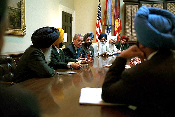 President Bush meets with Sikh Community Leaders in the White House Roosevelt Room to discuss,"the common commitment to make sure that every American is treated with respect and dignity. We're all Americans, bound together by common ideals and common values," said the President during his remarks. White House photo by Tina Hager.