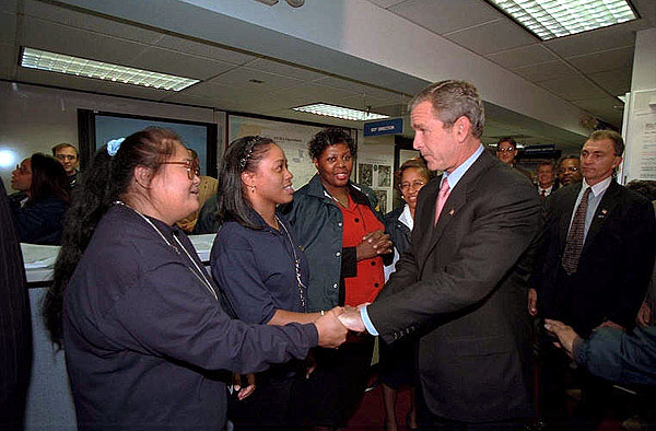 Federal Emergency Management Agency employees greet President Bush during his visit to the agency's headquarters to thank them for recent days of hard work Oct. 1. "I'm proud of the work that the FEMA employees all across the country are doing on behalf of America," said the President in his remarks. White House photo by Tina Hager.
