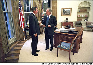 President George W. Bush meets with his new Director of Homeland Security Tom Ridge in the Oval Office shortly before swearing Mr. Ridge in for the position at a White House ceremony Monday, Oct. 8. White House photo by Eric Draper.