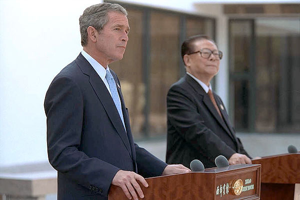 President George W. Bush and Chinese President Jiang Zemin deliver a joint statement to the media in Shanghai, People's Republic of China, Oct. 19. White House photo by Eric Draper.