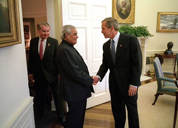 President George W. Bush welcomes Prime Minister Vajpayee of India to the Oval Office Friday, November 9. White House photo by Eric Draper.