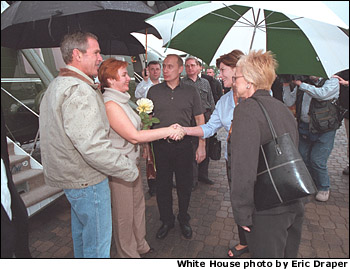 First Lady Laura Bush, right, greets Russian First Lady Lyudmila Putin with President George W. Bush and Russian President Vladimir Putin during their arrival at the Bush Ranch in Crawford, Texas, Wednesday, Nov. 14, 2001. White House photo by Eric Draper.
