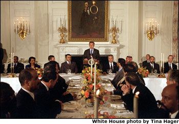 Hosting a dinner celebrating the holy month of Ramadan, President <a href="/news/releases/2001/11/20011119-14.html">George W. Bush</a> addresses ambassadors from Islamic nations and other distinguished guests in the State Room Nov. 19. "America has close and important relations with many Islamic nations So it is fitting for America to honor your friendship and the traditions of a great faith by hosting this Iftaar at the White House," said the President in his remarks. White House photo by Tina Hager.