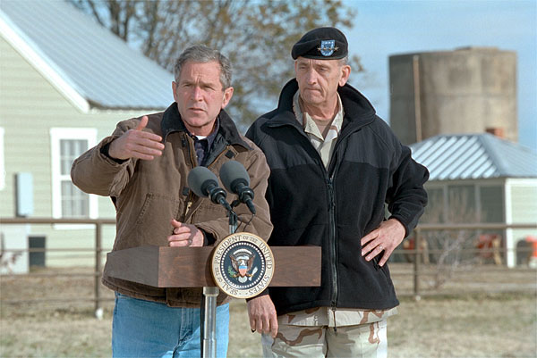 President George W. Bush and Army General Tommy Franks talk with the press in Crawford, Texas, December 28. White House photo by Susan Sterner.