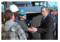 President George W. Bush talks with workers at the Port of New Orleans, Tuesday, Jan. 15, 2002. White House photo by Eric Draper