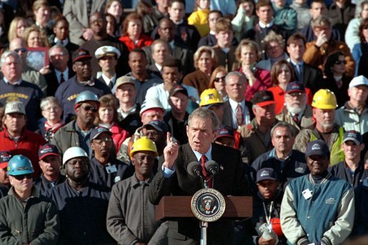 President George W. Bush speaks at the Port of New Orleans. “When a longshoreman is able to keep more of his own money, his family has more money to spend,” said the President in his remarks. Under the President’s economic plan, married couples would pay less tax, the Child Tax Credit would be raised and several million working Americans would drop immediately into the lower 10-percent tax bracket. White House photo by Eric Draper.