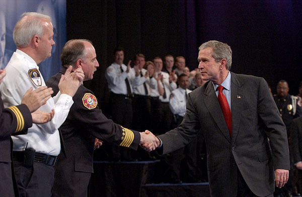 President George W. Bush greets local law enforcement officers after remarks on Citizen Preparedness at Lawrence Joel Veterans Memorial Coliseum in Winston-Salem, N.C. Wednesday, Jan 30, 2002. White House Photo by Eric Draper.