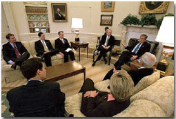 President George W. Bush and Sen. Joseph Leiberman join other visiting Senators in the Oval Office to discuss Armies of Compassion, a faith-based initiative from the United States Senate. "This legislation will not only provide a way for government to encourage faith-based programs to exist without breaching the separation of church and state, it will also encourage charitable giving as well," explained President Bush. White House photo by Tina Hager.