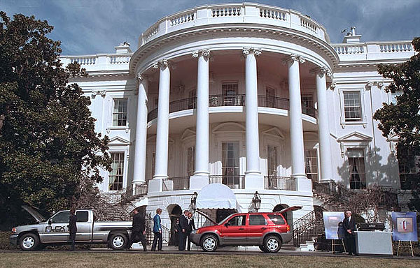 President George W. Bush inspects fuel-efficient cars on the South Lawn of the White House Feb. 25. "Technologies will also enable us to preserve our environment as we explore for natural gas at home," said the President in his remarks as Secretary of Energy Spence Abraham and Administrator Christine Todd Whitman of the Environmental Protection Agency stood by his side. White House photo by Paul Morse.