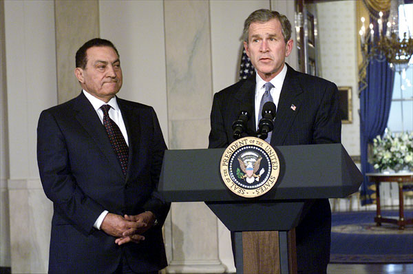 President George W. Bush and Egyptian President Mohammed Hosni Mubarek address the media in Cross Hall at the White House March 5. White House photo by Tina Hager.