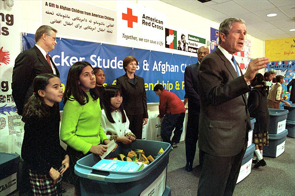 President George W. Bush talks addresses the media during his and Mrs. Bush's visit to Samuel W. Tucker Elementary School in Alexandria, VA, March 20. At the school they announced a partnership to help Afghan children prepare for school. "We want to make sure they've got tablets to write on and crayolas to color with, and even jump ropes to jump with," said the President. ".We've sent 4 million textbooks thus far, and there's another 6 million to go in Afghanistan, so the boys and girls will have something to read." White House photo by Susan Sterner.