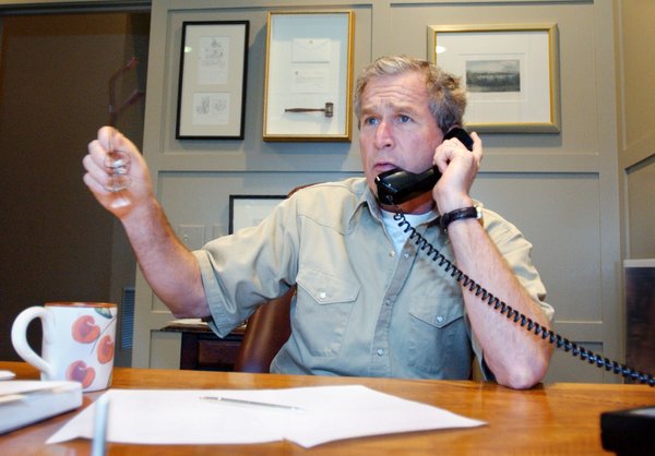President George W. Bush discusses developments in the Middle East during a phone call with Saudi Crown Prince Abdullah, Saturday morning, March 30, 2002 at the Bush Ranch in Crawford, Texas. White House Photo by Eric Draper.
