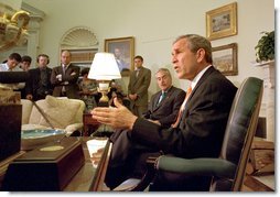 President George W. Bush and Columbian President Andres Pastrana talk with the media in the Oval Office Thursday, April 18. 