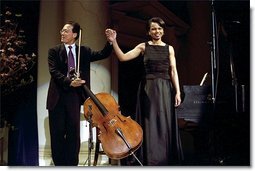 Cellist Yo-Yo Ma and National Security Advisor Dr. Condoleezza Rice take their bow after performing a duet to a Brahm's sonata at the presentation of awards by the National Endowment of the Arts and Humanities at Constitution Hall in Washington, DC , April 22. White House photo by Paul Morse.