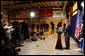 President George W. Bush delivers remarks to the press inside the Marine One hangar at the Bush Ranch in Crawford, Texas following his meeting with the Crown Prince of Saudi Arabia, Thursday, April 25, 2002. White House photo by Tina Hager.