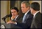 President George W. Bush speaks as European Union President and Spanish Prime Minister Jose Maria Aznar (left) and the European Commission President Romano Prodi listen during a press briefing in the East Room of the White House, Thursday, May 2, 2002. White House photo by Paul Morse.