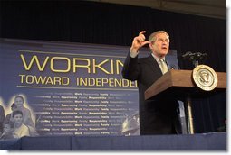 President George W. Bush discusses welfare reforms during a visit to St. Stephens Community House in Columbus, Ohio, May 10, 2002. "(St. Stephens) is a living example of what we call a one-stop center, where people who need help are able to come and find help to help themselves." White House photo by Paul Morse.