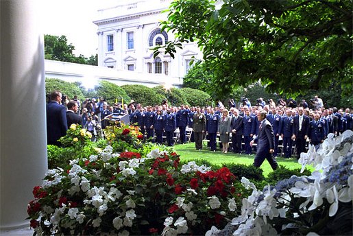 President George W. Bush approached the podium for the presentation ceremony of Commander-in-Chief's Trophy to the Air Force Academy football team in the Rose Garden Friday, May 17. "I'm proud of what this group of Americans have done on the football field. No more proud than those who wear the blue, I might add. And I'm proud of your commitment to our country," said the President in his address. 