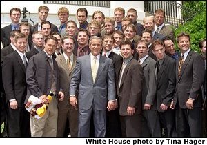 President George W. Bush poses with NCAA champions, the University of Minnesota men's hockey team, on the South Lawn May 21. White House photo by Tina Hager.
