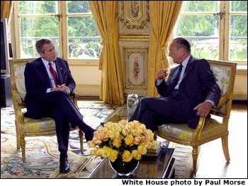 President George W. Bush talks with French President Jacques Chirac after arriving at the Elysee Palace in Paris, France on May 26, 2002. White House photo by Paul Morse.