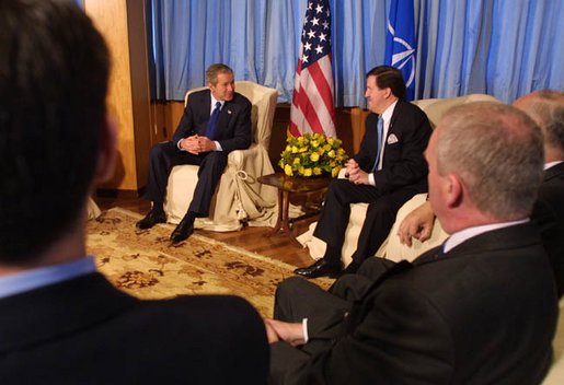 President George W. Bush with NATO Secretary General Lord Robinson at Practica di Mare Air Force base Near Rome, Italy on May 28, 2002. White House photo by Paul Morse.