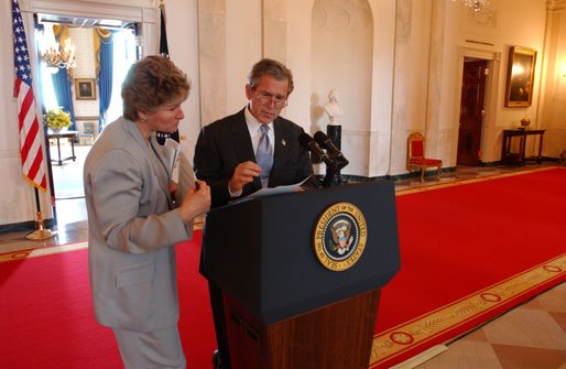 President George W. Bush prepares for his Thursday night speech about the Department of Homeland Security with Karen Hughes, Counselor to the President, at the White House Thursday afternoon, June 6, 2002. White House photo by Eric Draper.