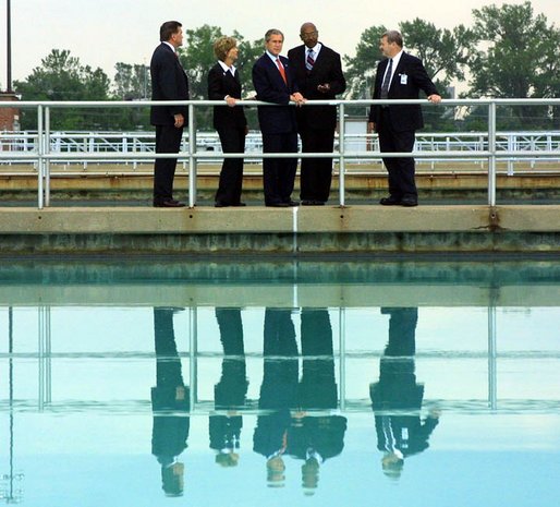 President George W. Bush tours the Kansas City Water treatment plant Tuesday, June 11. He is accompanied by Tom Ridge, Director of the Homeland Security Council, far left; Christie Todd Whitman, Administrator of the Environmental Protection Agency, center left; Mr. Gurnie Gunter, Director Of Water and Pollution Control for the city of Kansas City, Mo., center right; and John Reddy, Director Of Water Treatment Services. 