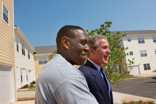 President George W. Bush and new home owner Al Smith tour Pryor Road Corridor Development in Atlanta, Georgia, Monday, June 17. White House photo by Eric Draper