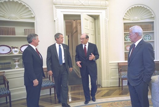 President George W. Bush talks with Federal Reserve Board Chairman Alan Greenspan, Treasury Secretary Paul O'Neill and White House Chief of Staff Andy Card after their lunch meeting Thursday, August 1, 2002. White House photo by Eric Draper.